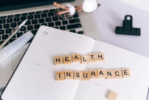 health insurance on notebook