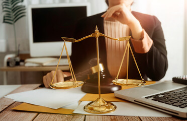 lawyer with gavel and scales of justice