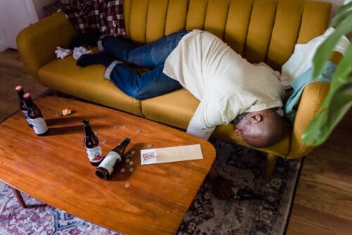 drunk man on couch