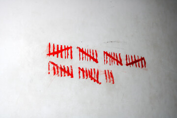tally marks on wall