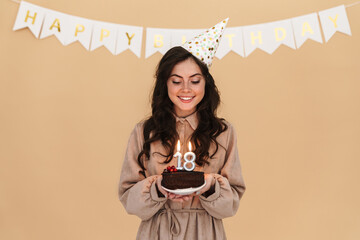 girl with 18 birthday candles