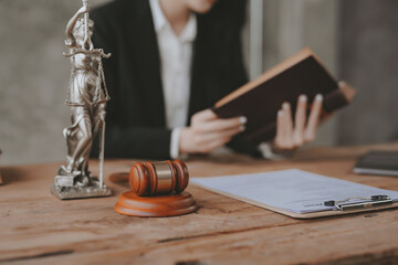 lawyer with gavel and lady justice